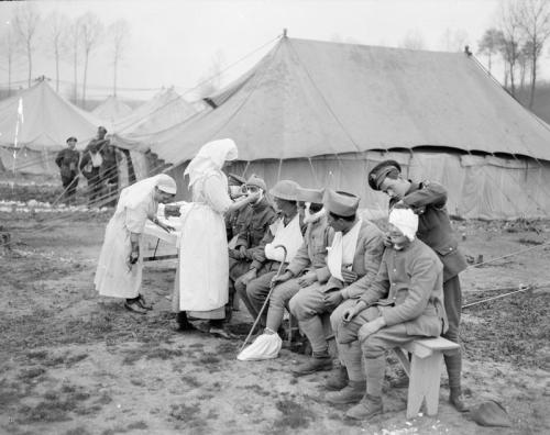 French and British wounded having their wounds dressed at No.29 Casualty Clearing Station, Gezaincourt, 27 April 1918. (IWM  © IWM (Q 8735)